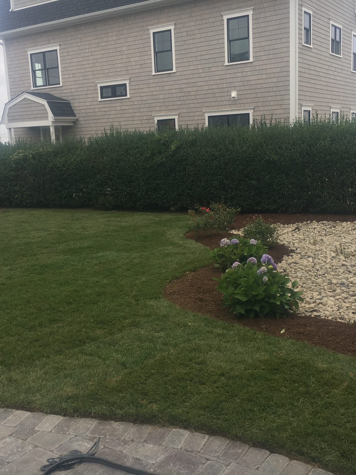 House with well manicured lawn